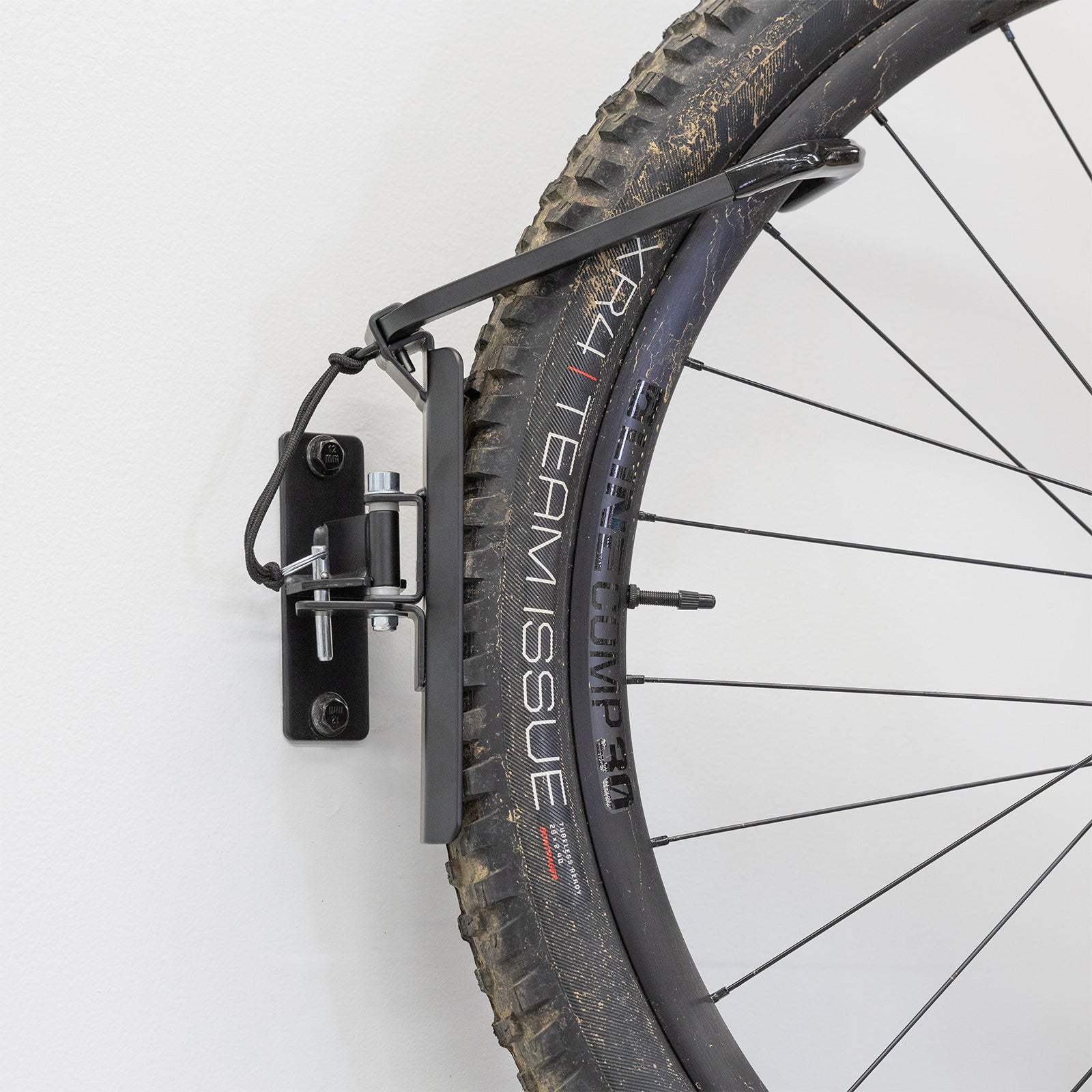 bike storage hook holds bicycle wheel